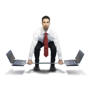 Man crouching down lifting a pole with laptops attached to it instead of weights