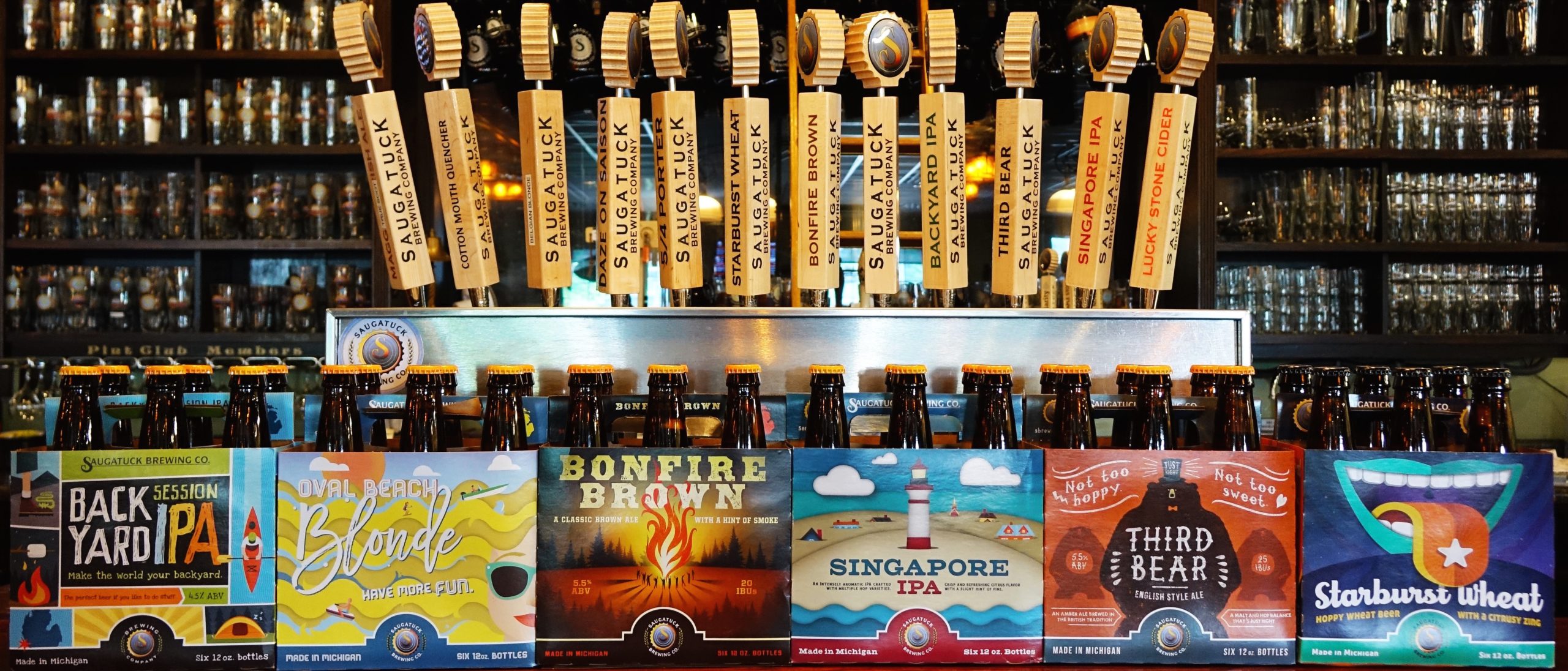 Saugatuck Brewing beer taps and 6 pack package design
