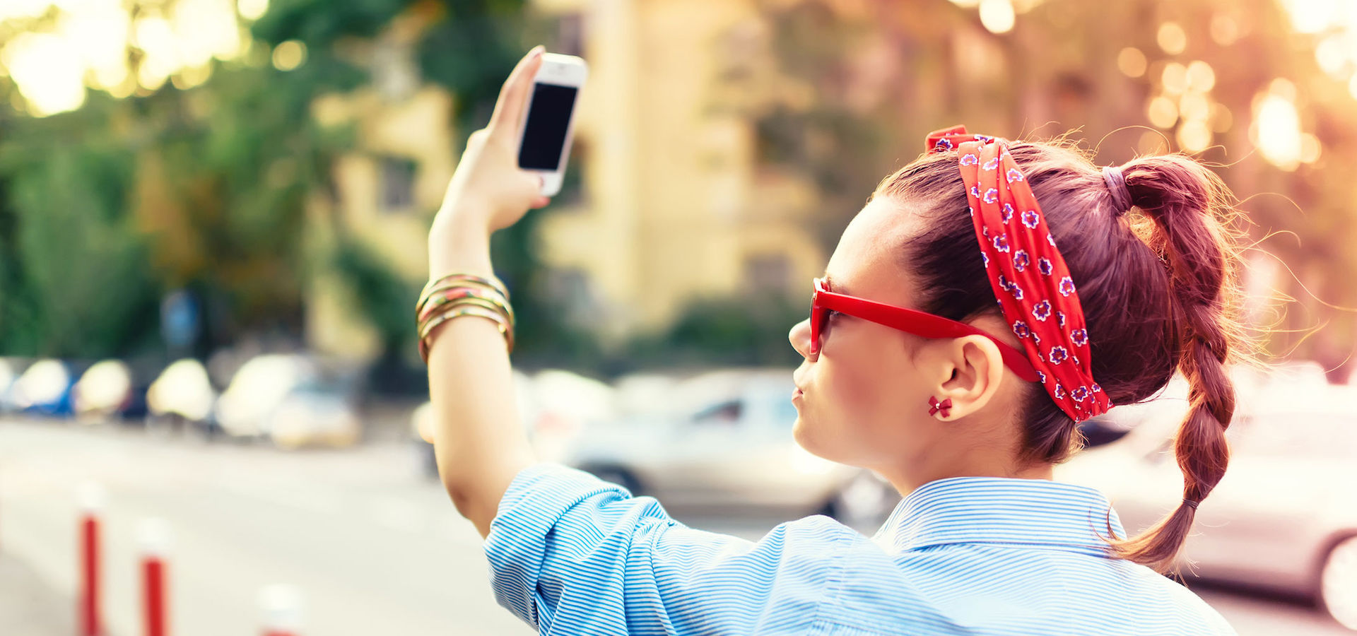 Girl taking selfies