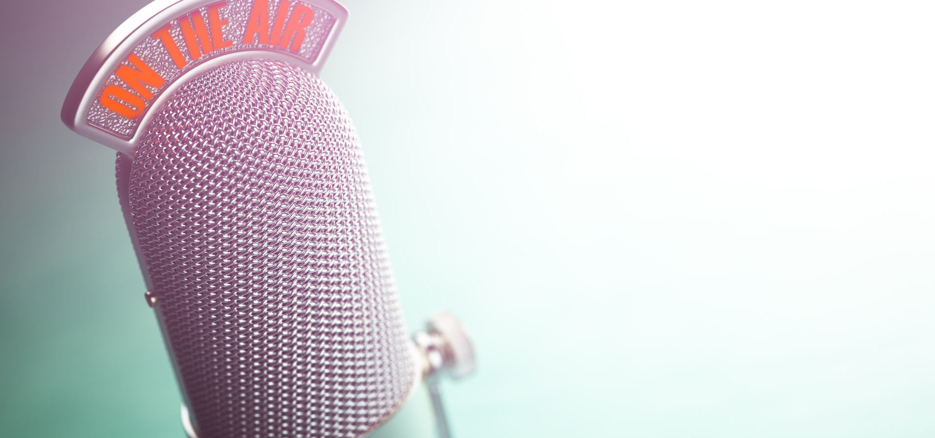 Retro old microphone with text "on the air"