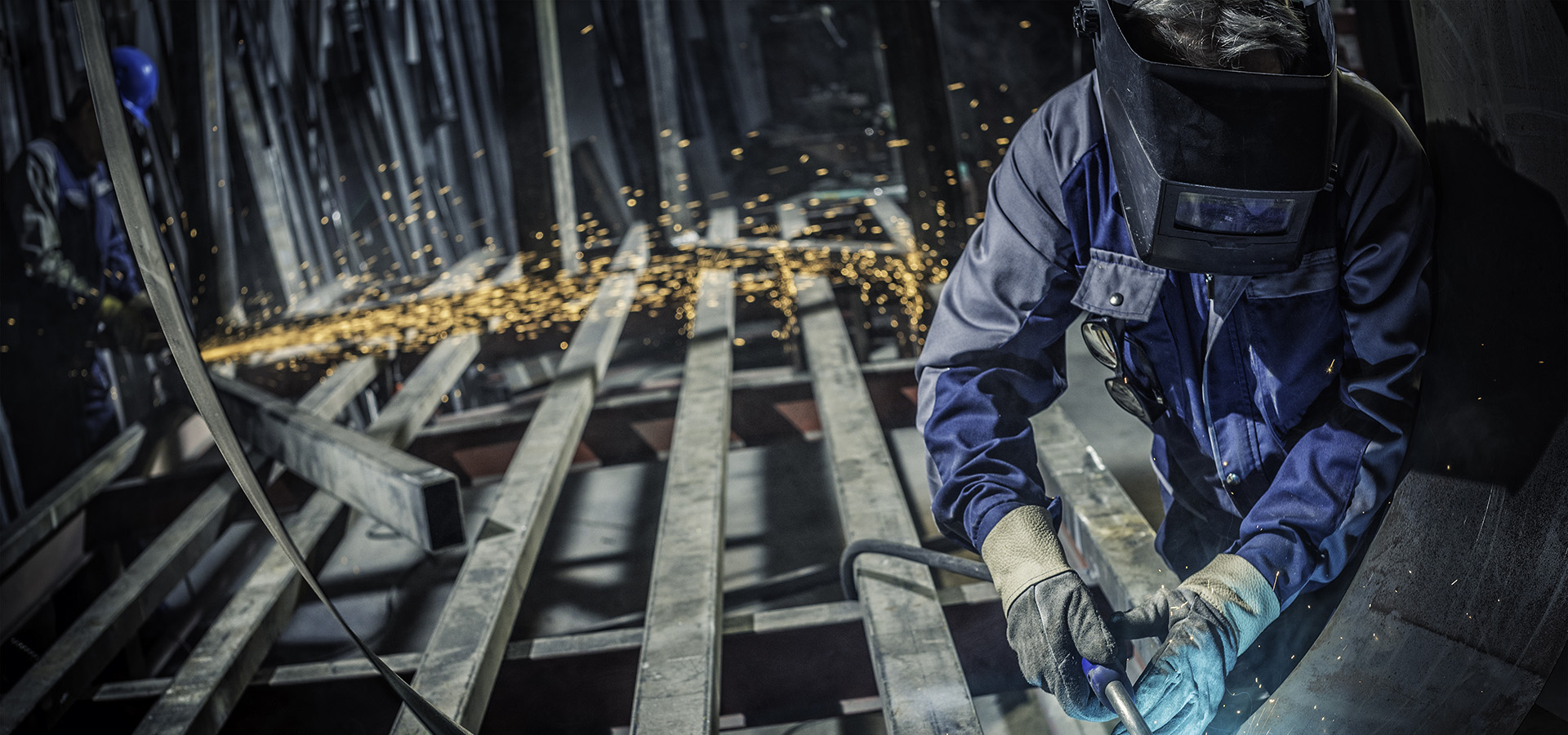 Industrial worker with welding tool